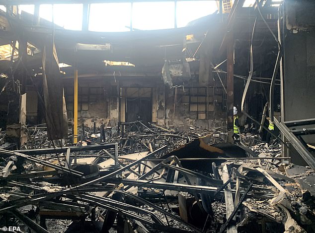 Terrorist incidents are not so common in Australia that they do not affect a prime minister's social calendar. Above, the interior of the Adass Israel synagogue.