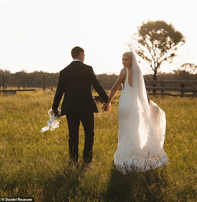 Alissa looked absolutely radiant in a traditional white wedding dress purchased from a luxury Sydney bridal boutique.