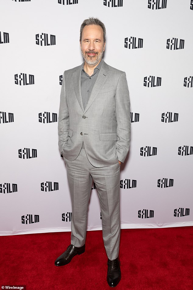 Denis Villeneuve, who directed Austin in Dune: Part Two, looked dapper in a light gray suit, although his medium gray shirt without a tie appears faded in contrast.