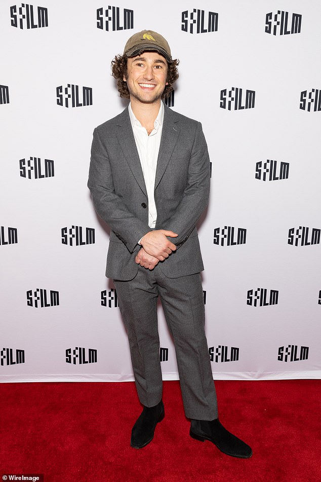 Gabriel LaBelle, who plays SNL creator Lorne Michael on Reitman's Saturday Night, looked dapper in a charcoal suit and black suede Chelsea boots.