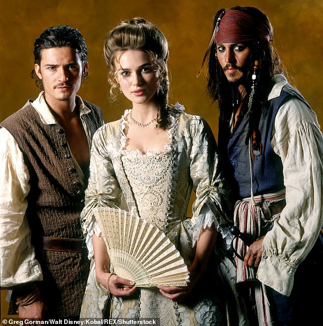 Keira (center) appeared in the films alongside Johnny Depp (right) and Orlando (left).