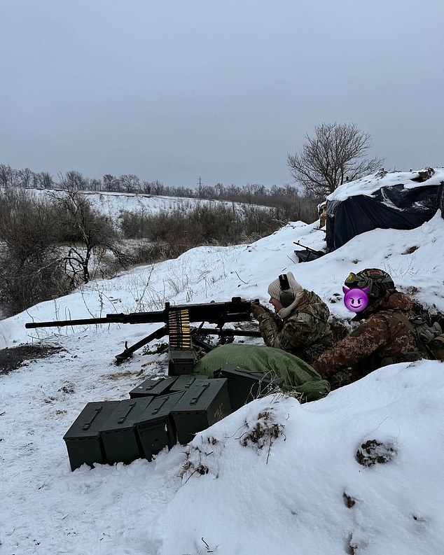 The 30-year-old also showed a photo of her lying down operating a machine gun