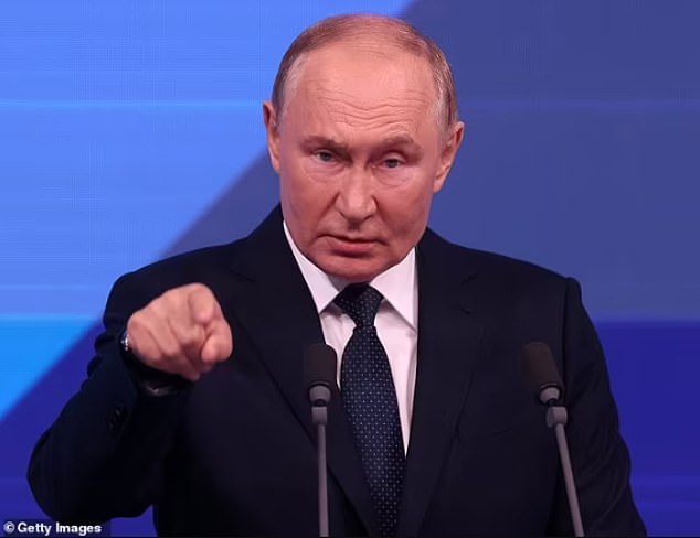 Putin is seen issuing a threat to the West over the capabilities of his latest missiles.