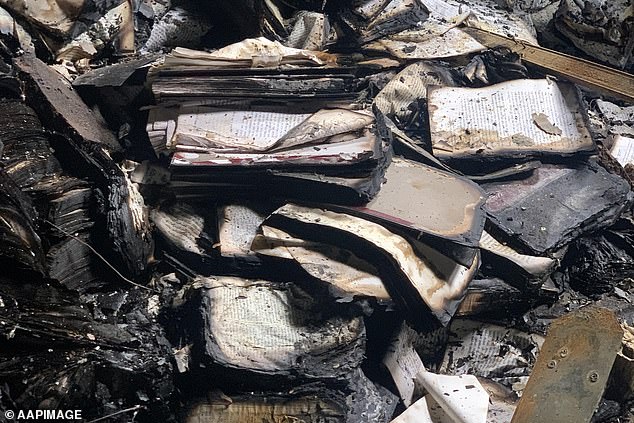 Books and papers burned after the bombing in the southeast of the city