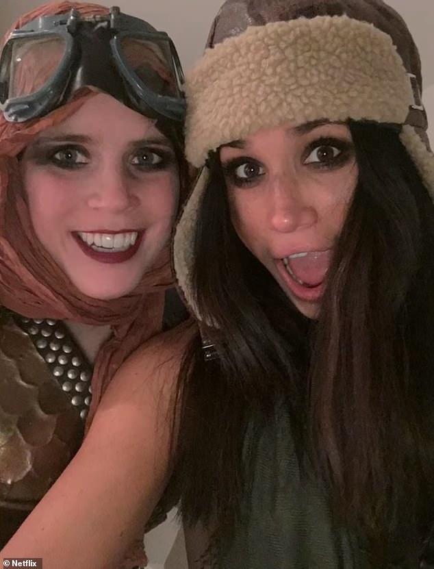 In another snap from their big night out, Meghan is seen posing for a fun selfie with Princess Eugenie.