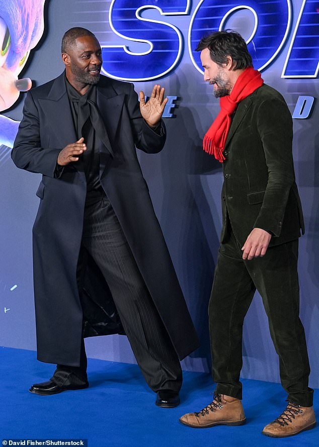 Idris and Keanu shared a sweet moment together at the photo shoot.