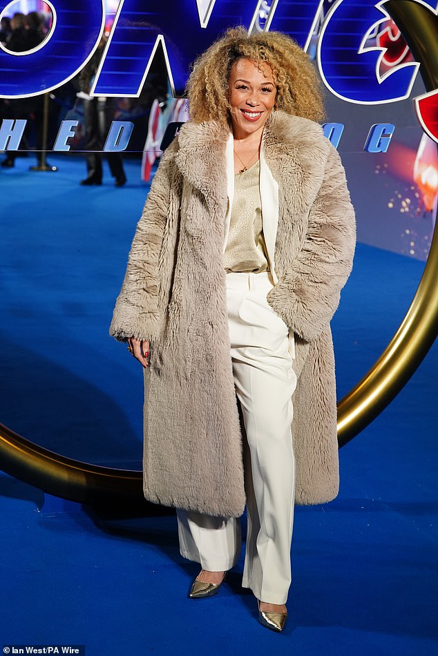 TV presenter Ria Hebden looked glamorous in a sleek white look and faux fur coat.