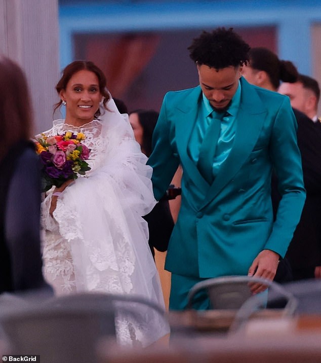 For the ceremony, basketball player Marley looked dapper in a vibrant teal suit, comprised of a satin shirt, fitted jacket, tailored pants and tie.