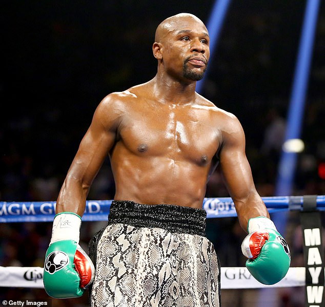 The former world champion (pictured in 2014) found himself in trouble after a large crowd descended on him and his entourage during a visit to a jewelry store in Hatton Garden.