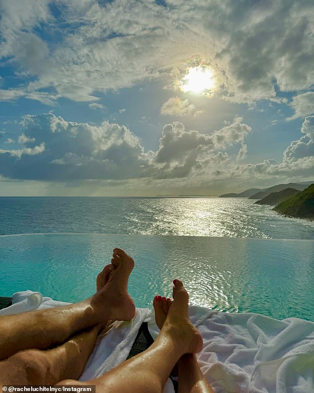 She teased a photo of her mystery man when she posted a photo of his feet next to hers as they sat on a cabana-style bed overlooking the ocean