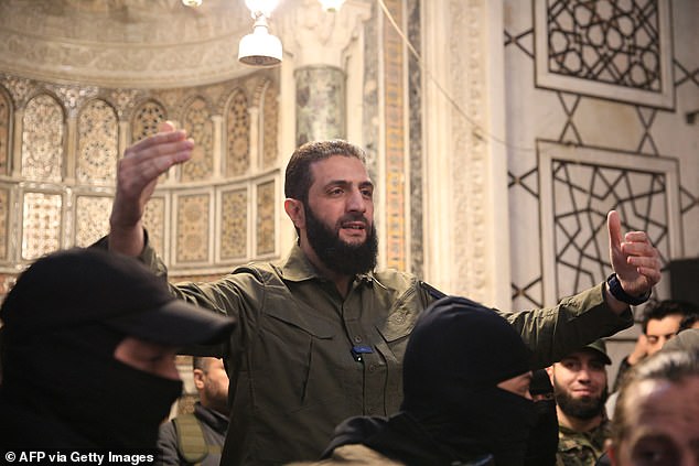 The leader of the Syrian Islamist group Hayat Tahrir al-Sham (HTS), Abu Mohammed al-Jolani, addresses a crowd at the capital's iconic Umayyad Mosque on December 8.