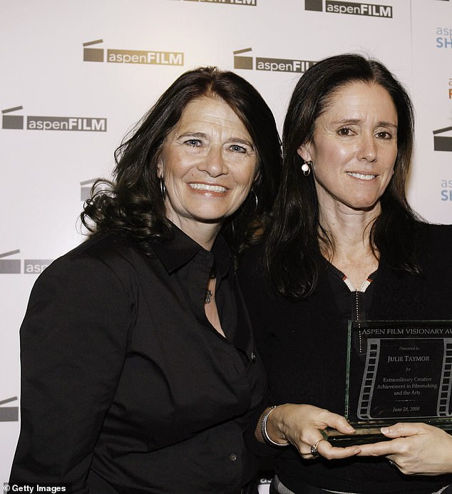 Among the people Luttrell represented were creatives like Julie Taymor, with whom she was photographed in Aspen in 2008.