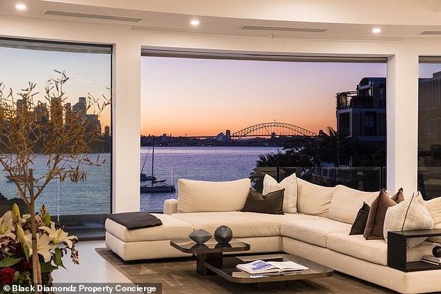 Overlooking the waterfront of Sydney Harbour, the street attracts huge prices to match the mega-rich looking to snap up a piece of the prized road (pictured: 50 Wolseley Road).