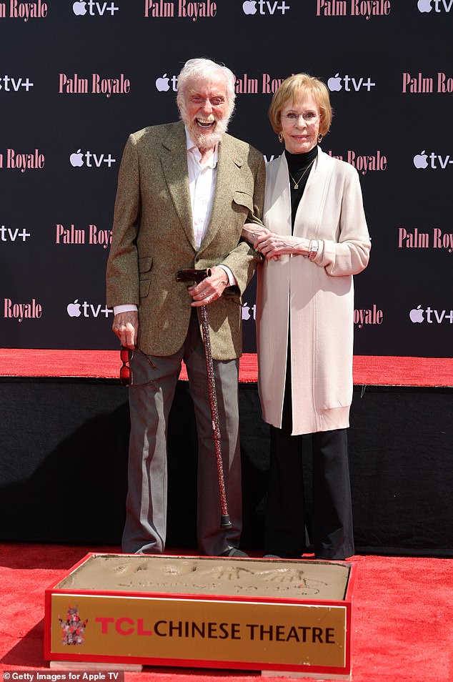 Van Dyke also expressed hope that his “community at Serra Retreat will survive these terrible fires”; pictured with Carol Burnett in Hollywood in June