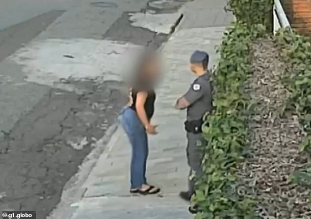 The woman was seen arguing with police officers in São Paulo, Brazil, on October 21, after they responded to a call from her daughter about an argument they had had.