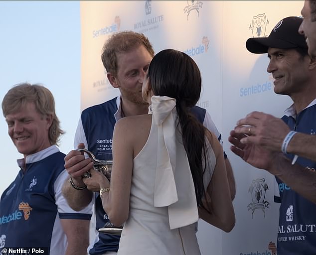 In one scene, Harry and Meghan share a sweet kiss, but the Florida event was already photographed back in April.