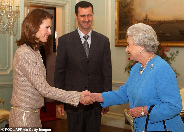 Asma and Bashar al-Assad meet the Queen in 2002. Later, as Asma's husband's henchmen skinned their victims alive, she dressed in designer clothes.