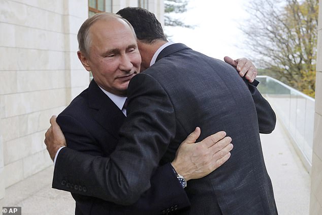 Putin hugs Assad during a meeting in 2017. Russia has created a massive military presence in Syria with an air base in Latakia and a naval facility in Tartus, which is the only Russian naval center in the Mediterranean.