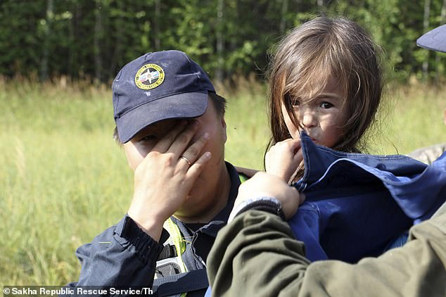 Her rescuer Artyom Borisov (pictured) admitted he could barely hold back his tears when he found her.