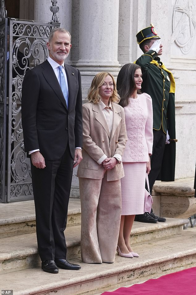 Ms. Meloni opted for a beige pantsuit with a double-breasted jacket and a pair of wide-leg pants.