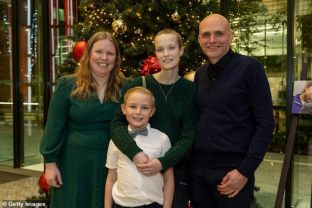 Liz made the incredibly mature decision to donate her body to medical science after her death in the hopes that studies of her condition could help prevent another family from being torn apart like they did. Pictured with his family in November.