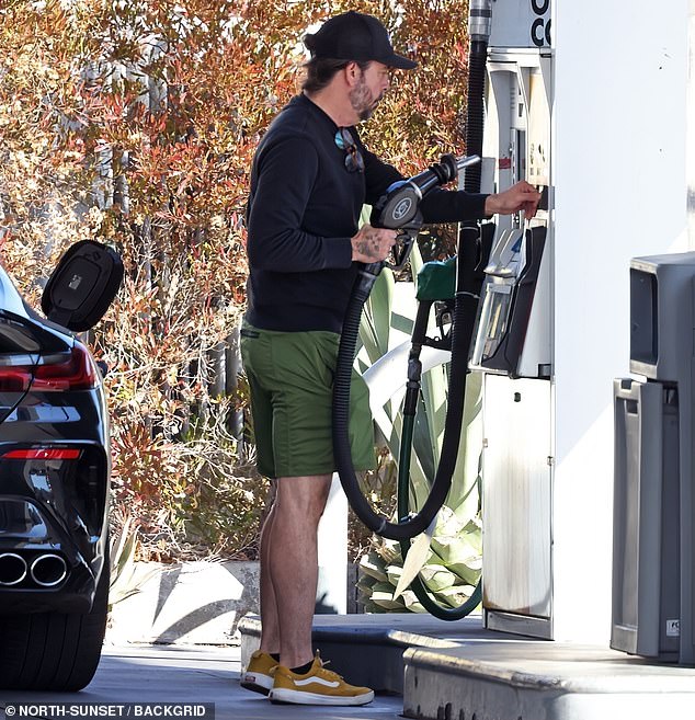 Grohl picked up a few packs of cigarettes and a hot drink before heading to his next destination - not long after the Foo Fighters reportedly 'cancelled' plans for a summer tour next year