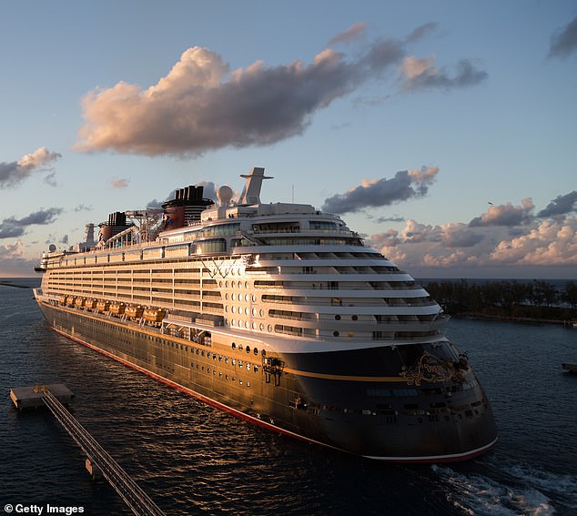 Disney has increased tipping rates on its cruises. Pictured is the Disney Dream cruise ship departing from Nassau, Bahamas