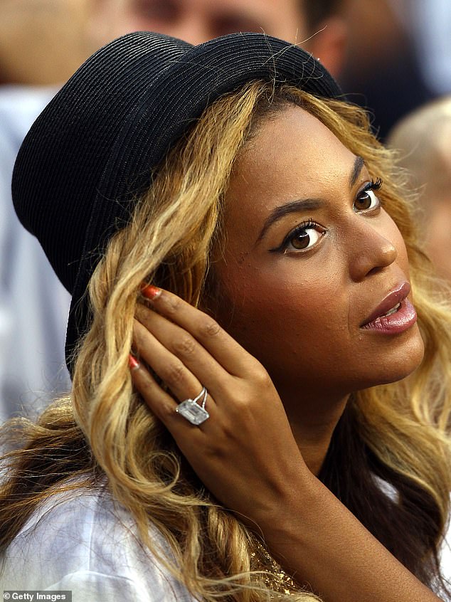 She previously wore a beautiful emerald-cut diamond that was described as 18 carats and cost around $5 million; pictured at the 2011 US Open in Queens, NYC