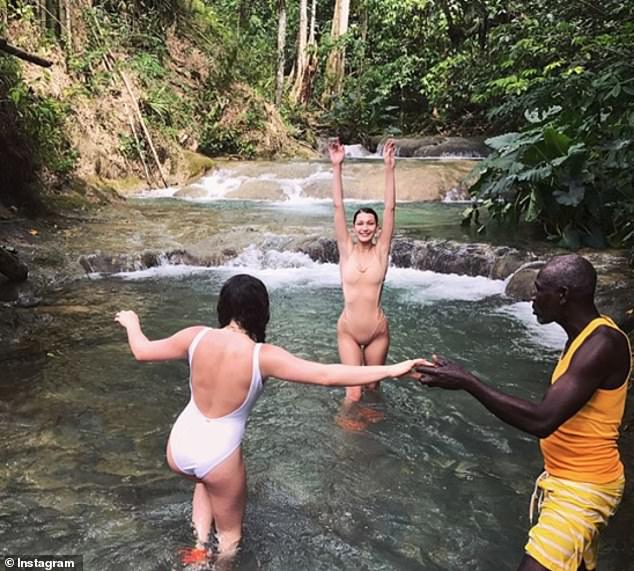 Bella Hadid made her followers do a double take when she rocked this nude swimsuit while exploring a waterfall with friends.