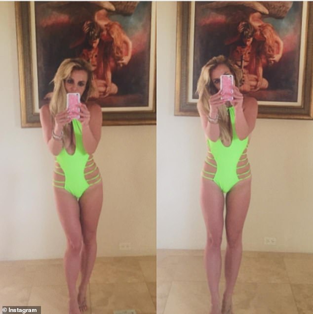 Based in California, Britney Spears is no stranger to the beach and revealing swimsuits. Here, she takes a selfie wearing a neon green strappy one-piece, which will leave her with some interesting tan lines.