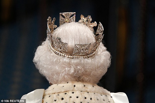 Queen Elizabeth II is seen during the State Opening of Parliament at the Palace of Westminster in London on October 14, 2019.