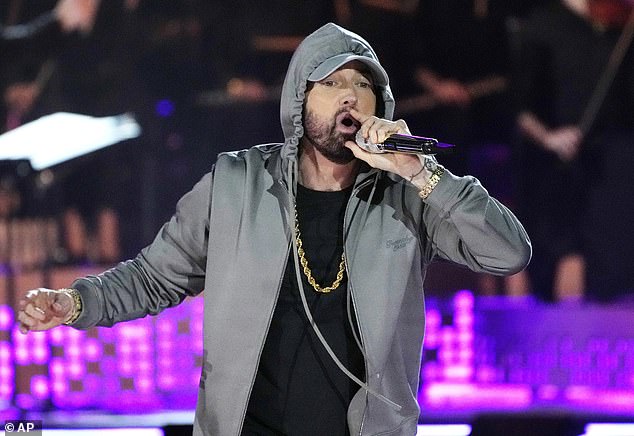 Eminem was cool, he came around, he was great,” Sandler revealed on Friday's episode of The Dan Patrick Show; Eminem seen in June