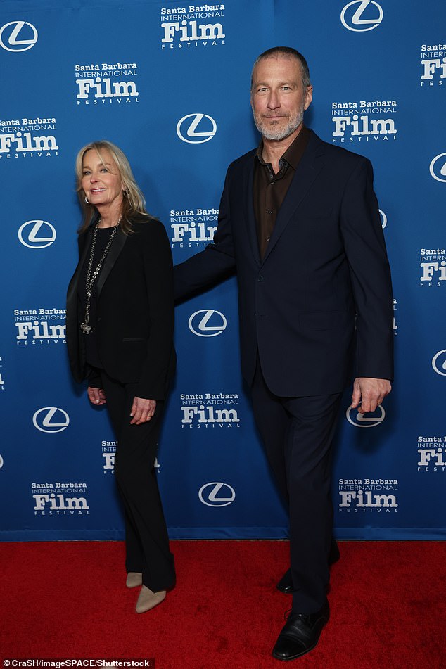 Walking the red carpet at the Ritz-Carlton Bacara before the annual Kirk Douglas Award for Film Excellence ceremony, Bo smiled alongside John.