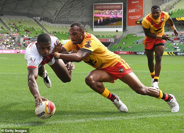 Australia's northern neighbor will participate in the NRL competition in 2028 (pictured PNG, in yellow, red and black, will play in the Rugby League World Cup)