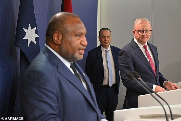 Left to right: PNG Prime Minister James Marape, football boss Peter V'landys and Anthony Albanese at the official announcement of the new club on Thursday.