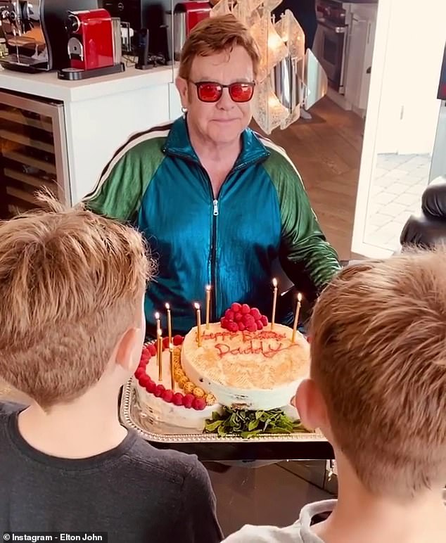 'I want to be with my family': Sir Elton wants to spend more time with his two sons, Zachary, 10, and Elijah, eight