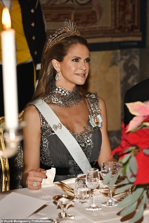 Princess Madeline (pictured), Princess Victoria's younger sister, looked equally stunning in a silver dress complete with metallic embroidery