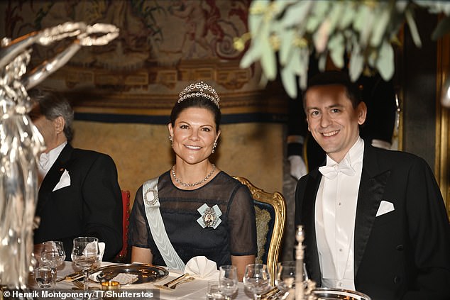 Princess Victoria sat next to chemistry winner John Jumper (pictured) and smiled for photos