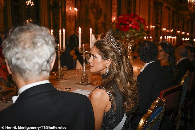 Princess Madeline wore her long blonde hair classically blow-dried and added a gold and diamond encrusted tiara