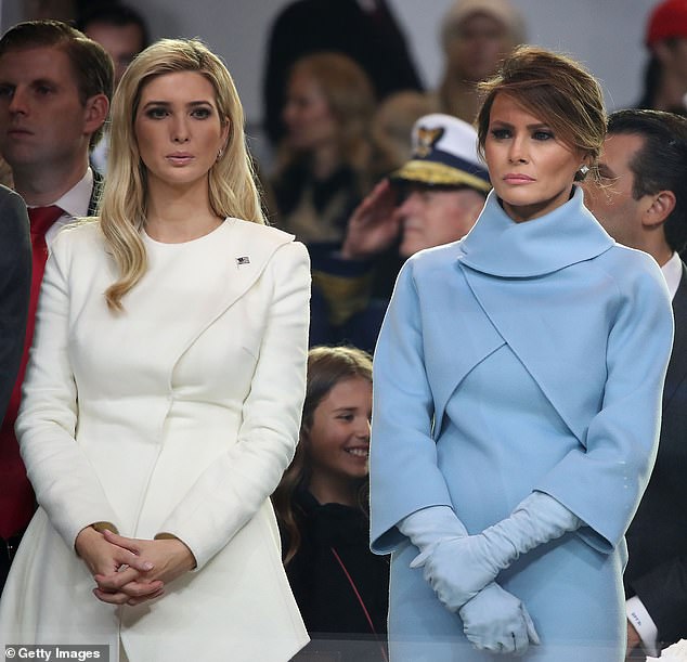 A rare photo of Ivanka Trump and Melania Trump standing together - they stood side by side as they watched Donald Trump's inaugural parade in January 2017