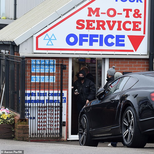 Tulisa had her hood down and covered her face with a mask during the excursion to a garage in Cheshire, where she arrived in a black Range Rover Evoque.