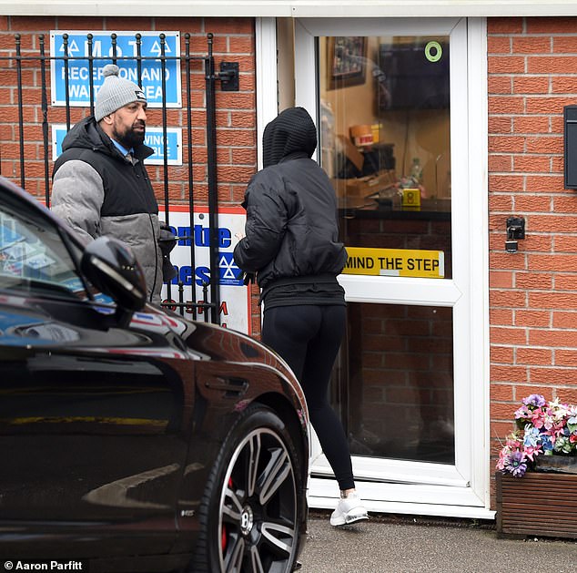 She was seen chatting with a member of staff.