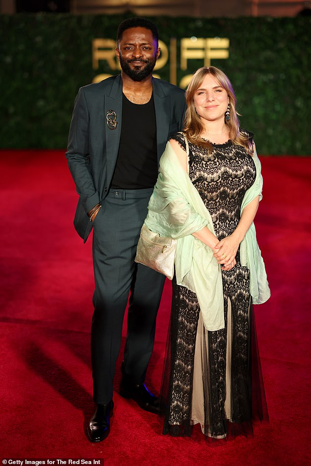 Ozzy Agu and Rachel Ramsay posed together on the red carpet