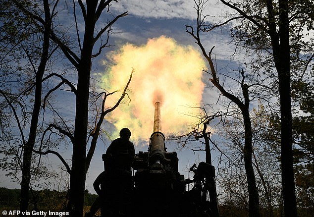 Ukrainian servicemen of the 43rd Artillery Brigade fire a 2S7 Pion self-propelled gun at Russian positions on the front line in the Donetsk region.