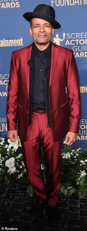 Filmmaker Mario Van Peebles, 67, looked dapper in a cranberry red pantsuit with black accessories.