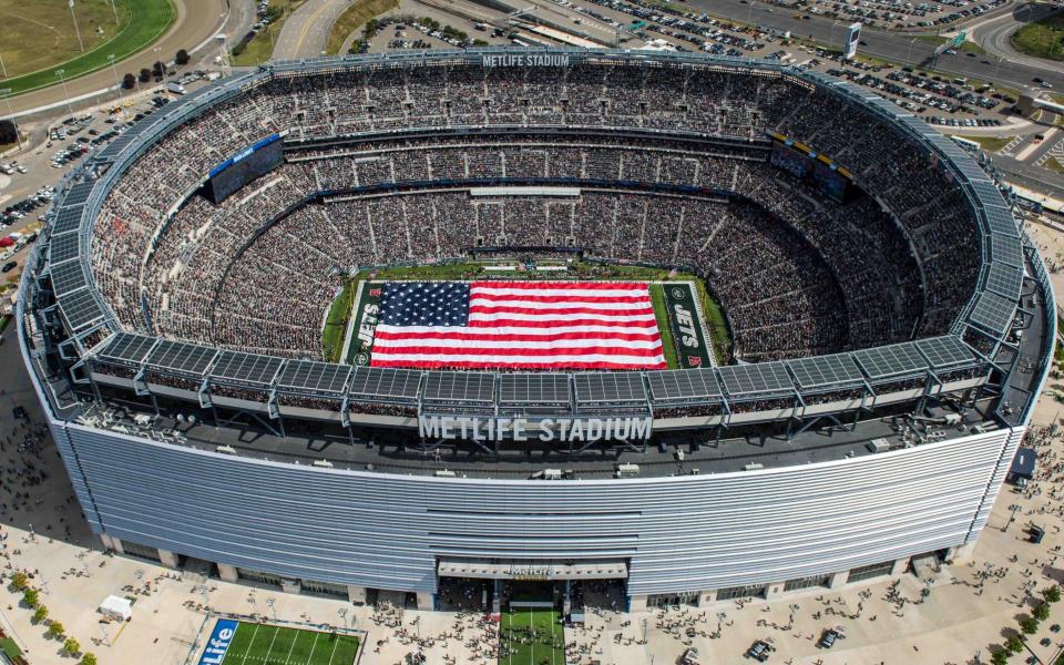 An aerial view of MetLife Stadium during the national anthem with a 100-yard American flag before the start of the game between the Cincinnati Bengals and the New York Jets on September 11, 2016.