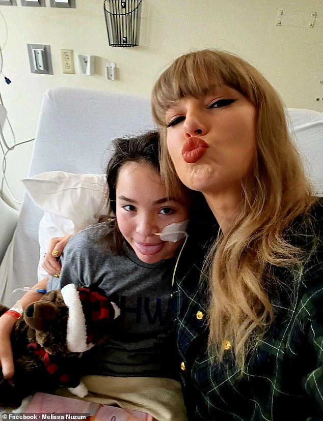 Taylor gave Baylee a signed copy of her book Eras Tour and accepted a gift from the girl, a diamond art picture.