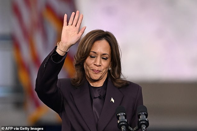 Kamala Harris waves to supporters at the end of her concession speech at Howard University in Washington, DC, on November 6, 2024