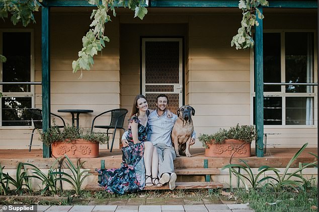 The $1.1 million they spent on a dream tropical home near the water would hardly buy a typical home in western Sydney, let alone a large area (pictured, Arianne and Chris Endrizzi with Nero, their mastiff Italian 11 years old).