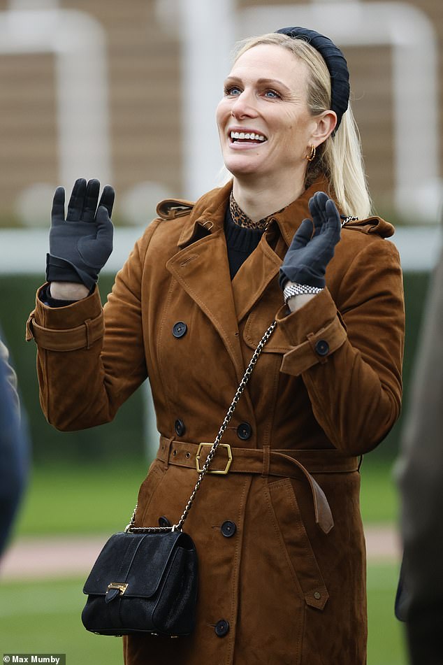 Adding a pop of color to her ensemble, Princess Anne's daughter could be seen wearing a leopard print blouse and a black wool jumper.